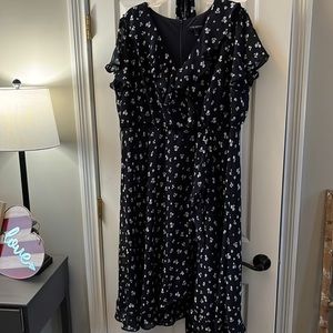 Ready for spring? This light & airy spring dress w navy blue floral pattern.